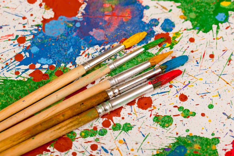 Paints and brushes stock images