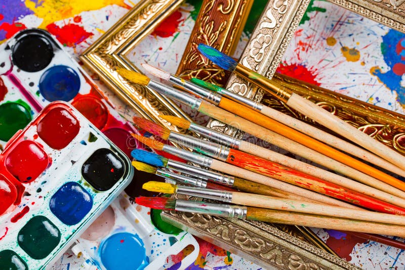 Paints and brushes royalty free stock photography