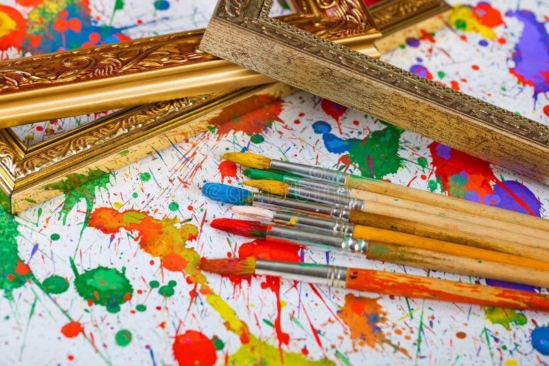 Paints and brushes stock photos