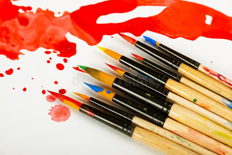 Paints and brushes royalty free stock photo