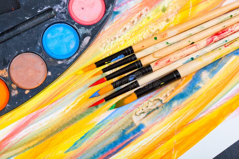 Paints and brushes stock photo