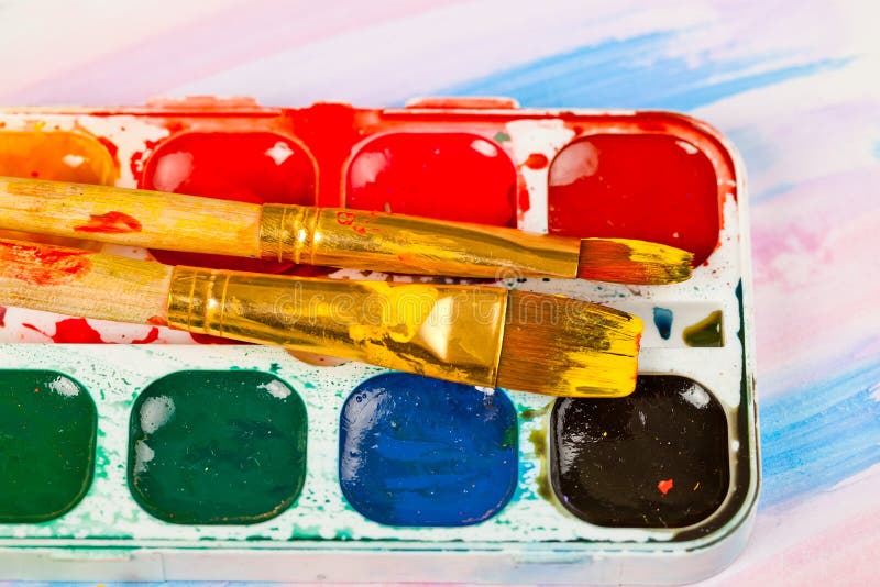 Paints and brushes stock image