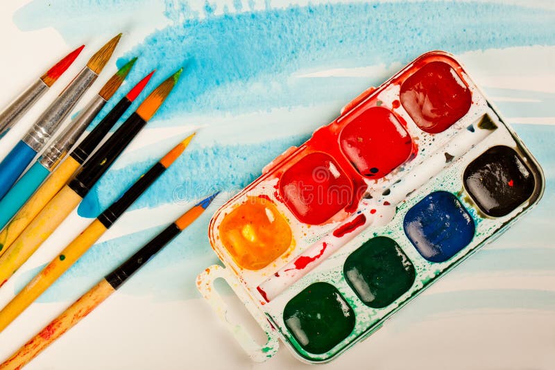 Paints and brushes stock photo
