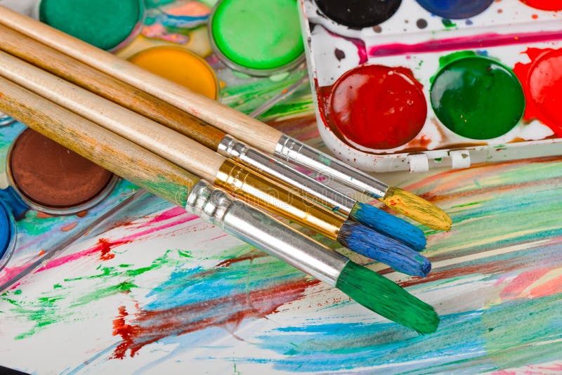 Paints and brushes stock photo