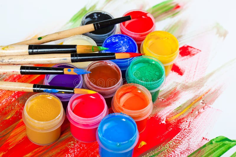 Paints and brushes royalty free stock photography