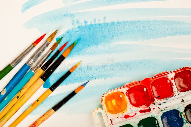 Paints and brushes royalty free stock photos