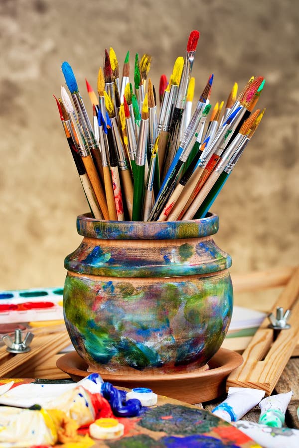 Paints and brushes stock photography