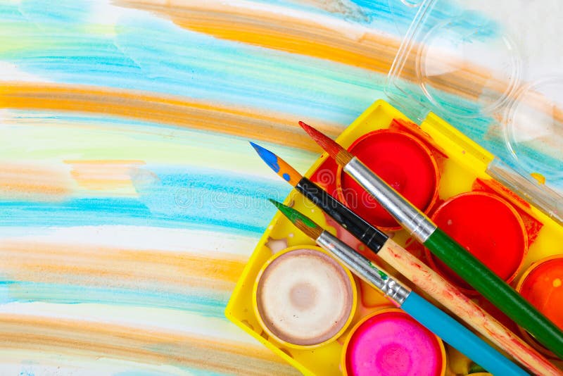 Paints and brushes royalty free stock image