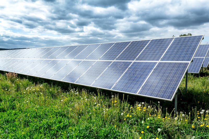 Solar energy panels against dramatic storm sky. Solar energy panels against dramatic storm sky