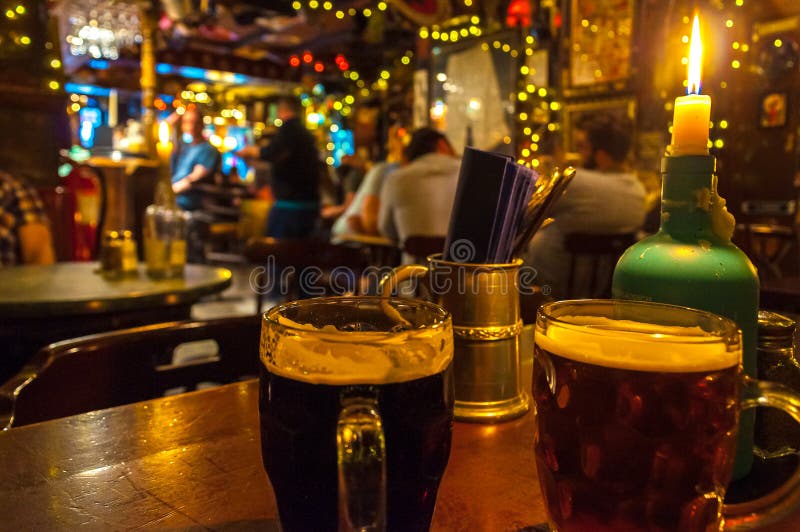 Pair of Beer Glasses Making a Toast Stock Photo Image of glass