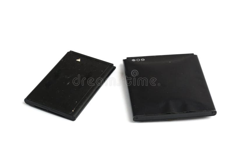 A pair of black used rechargeable lithium ion batteries royalty free stock photo A pair of black used rechargeable lithium ion batteries royalty free stock photo