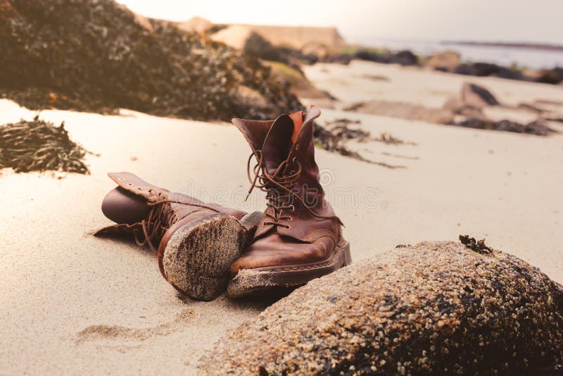 Boots on the beach stock image. Image of person, healthy 23420285