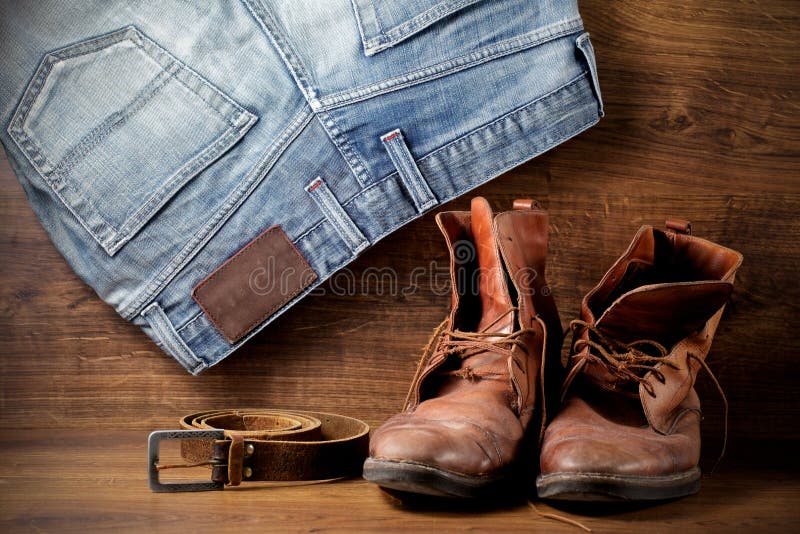 A Pair of Boots, Jeans and Leather Belt Stock Image - Image of ...