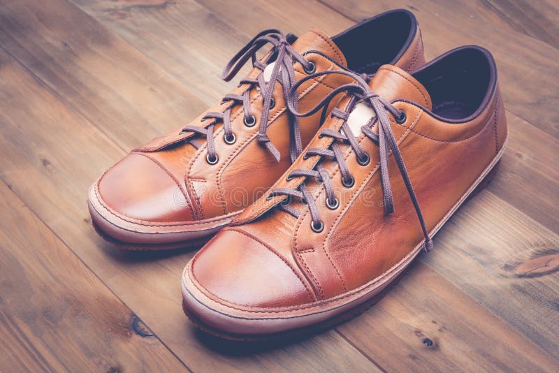 A Pair of Brown Leather Shoes with Vintage Stock Photo Image of sole