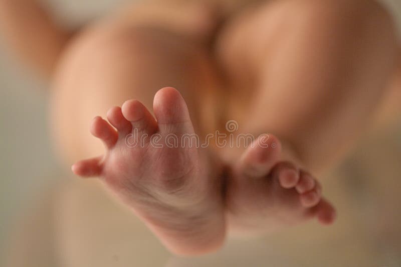 A pair of cute baby feet stock photo. Image of feet 268900394
