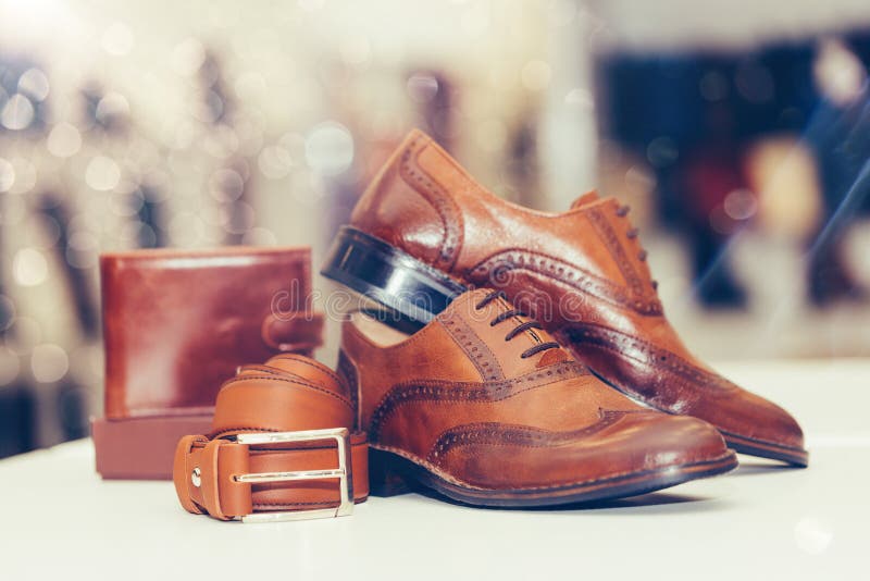 Pair of Elegant Men`s Leather Shoes, Wallet and Belt on a Shelf of a Shop  Stock Photo - Image of model, luxury: 168749314