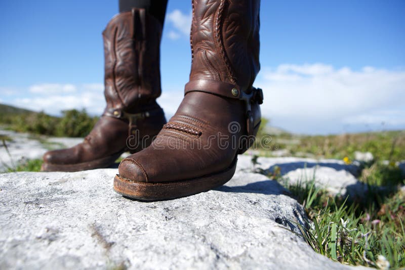 Pair of female brown leather boots royalty free stock images Pair of female brown leather boots royalty free stock images