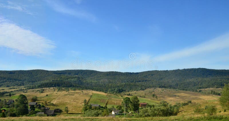 Photo of the Carpathian Mountains, which have a lot of coniferous trees. Forest and mountain landscape in the early autumn season stock photo Photo of the Carpathian Mountains, which have a lot of coniferous trees. Forest and mountain landscape in the early autumn season stock photo