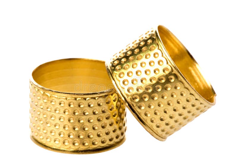 Pair of gold thimbles stock photo. Image of hard, protective 6061468