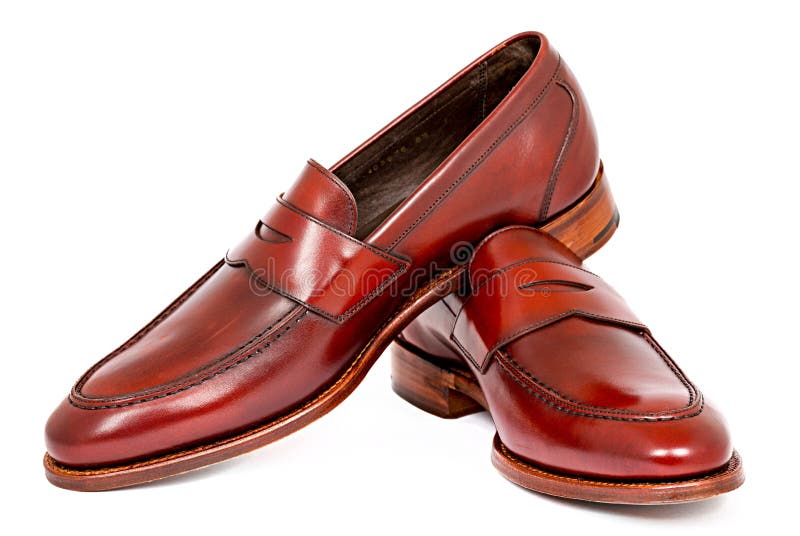 Pair of leather cherry calf penny loafer shoes together