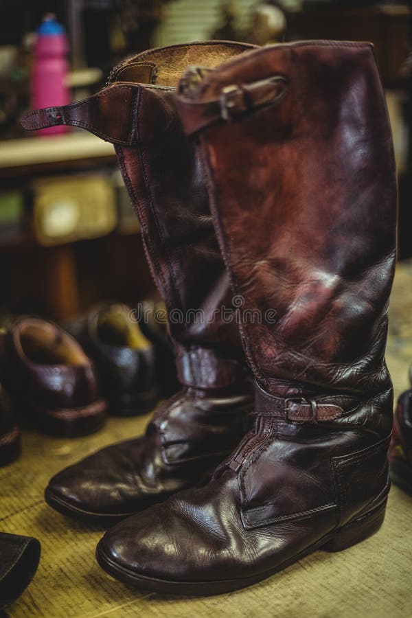 Pair of long leather boots stock photo. Image of 77218524