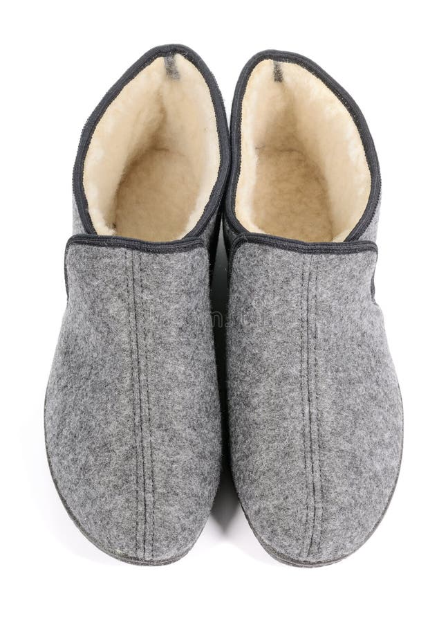 Pair of men s grey slippers on white background.