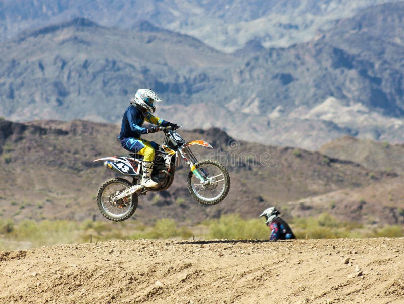 A Pair of Motocross Racers Practice at SARA Park. LAKE HAVASU CITY, ARIZONA - JUNE 7: SARA Park on June 7, 2015, in Lake Havasu City, Arizona. A pair of royalty free stock images A Pair of Motocross Racers Practice at SARA Park. LAKE HAVASU CITY, ARIZONA - JUNE 7: SARA Park on June 7, 2015, in Lake Havasu City, Arizona. A pair of royalty free stock images