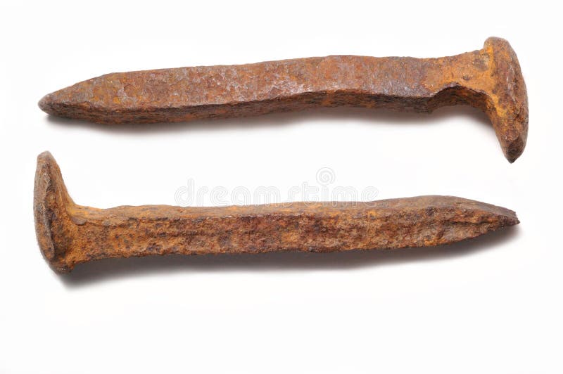 Pair of old rusty railroad spi