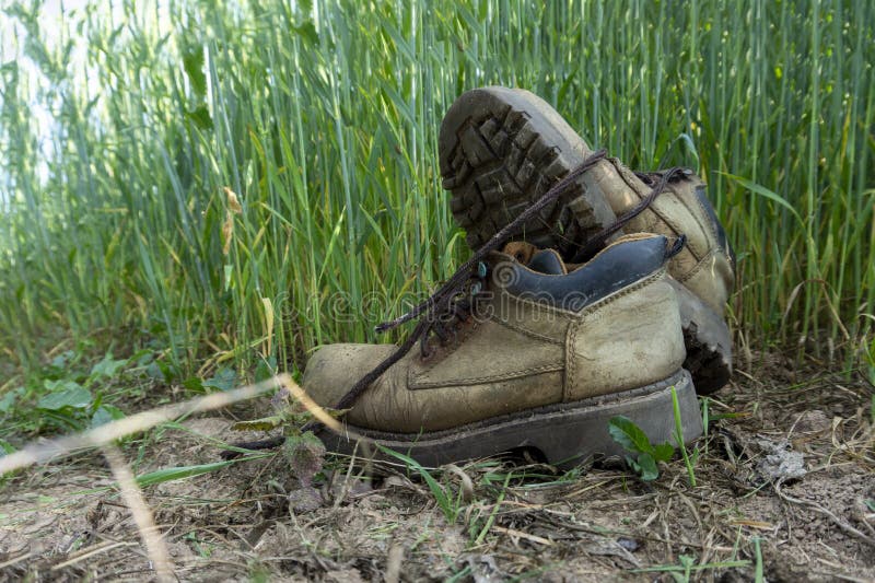 Pair of Old Worn Hiking Boots an a Gravel Path Stock Image - Image of ...