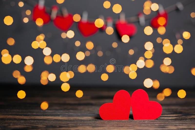Pair of Red Hearts on Lights Background Love and Valentine Concept on a  Wooden Table Stock Image - Image of valentines, romantic: 208341095