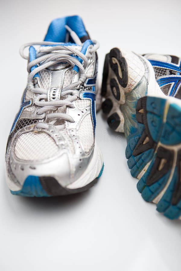 Pair of Running Shoes on a White Background Stock Photo - Image of ...