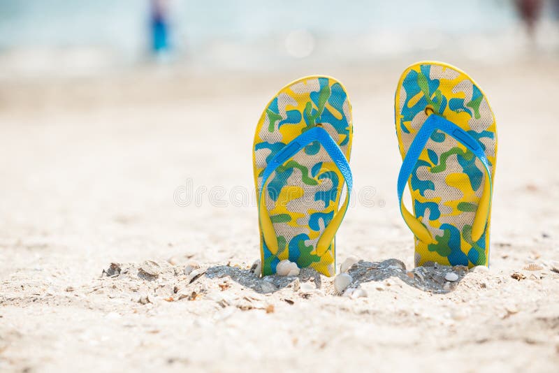 Pair of Sandals in Sand Beach Stock Photo - Image of scenic, idyllic ...