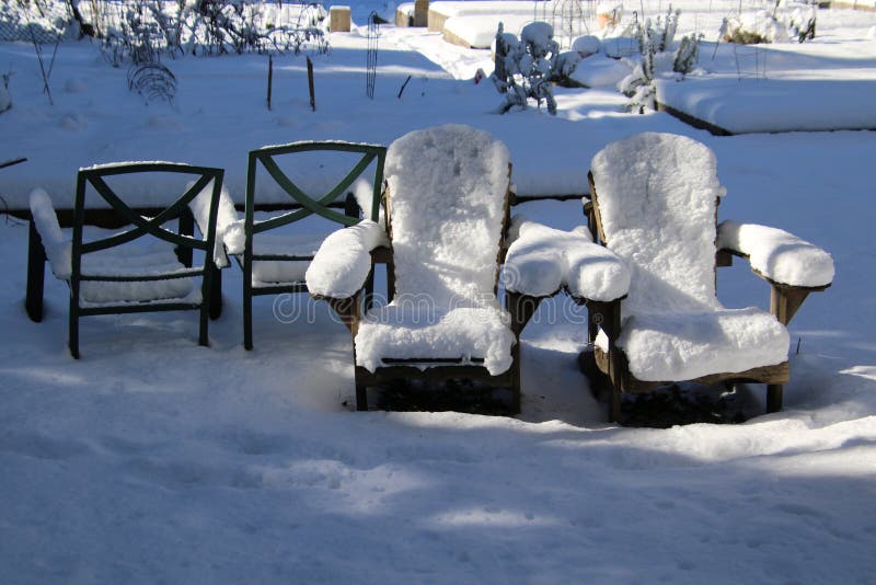 A Pair of Snow Covered Adirondack Chairs Stock Photo Image of chairs