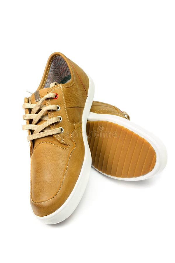 Pair of Tan Color, Leather Sneakers Isolated on White Background. Stock