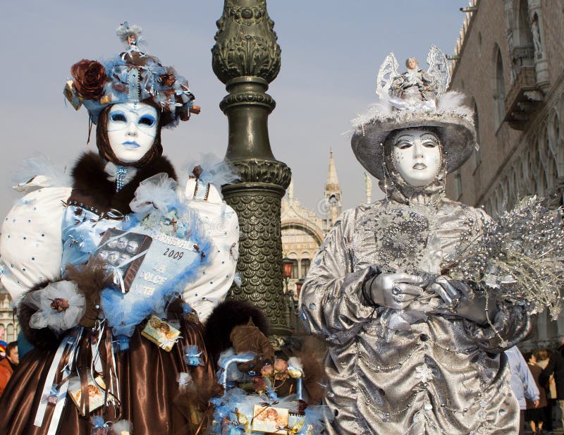 Women in Masks and Costumes with Bridge of Sighs Behind, at Venice