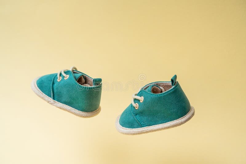 A Pair of Walking Small Children S Shoes with a Levitation Effect Stock