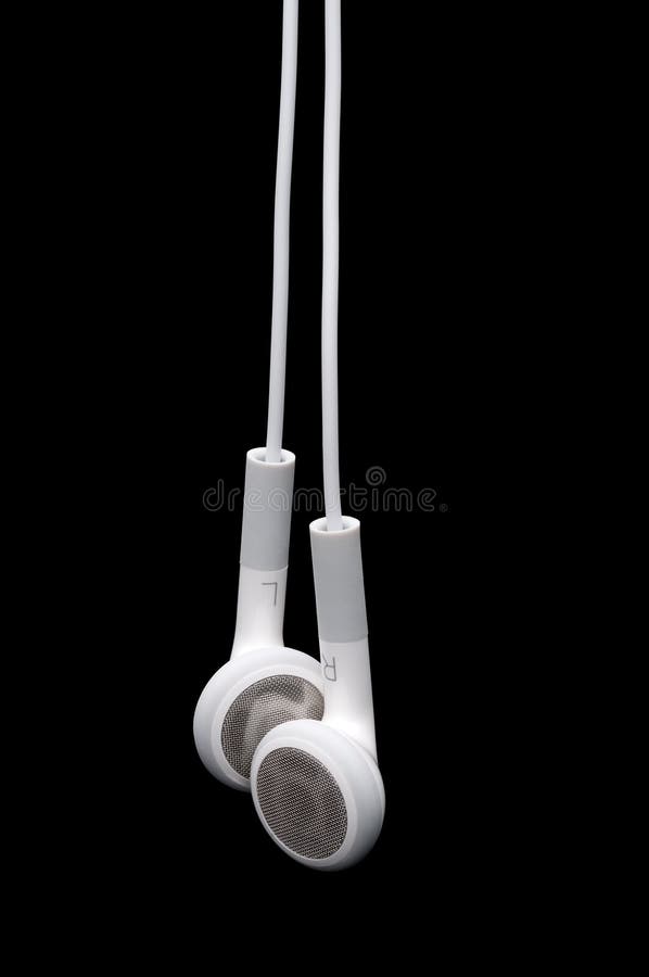 A pair of white earbud earphones hanging against black