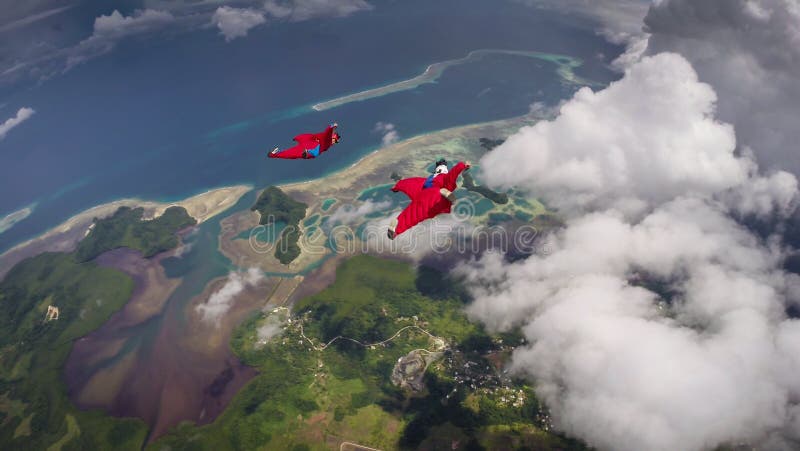 Pair of Wingsuit Flyers in Palau stock images Pair of Wingsuit Flyers in Palau stock images