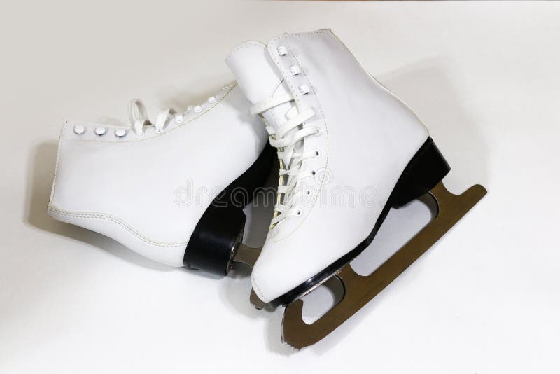 Pair of Women`s White Figure Ice Skates on White Background Stock Photo Image of cold, metal
