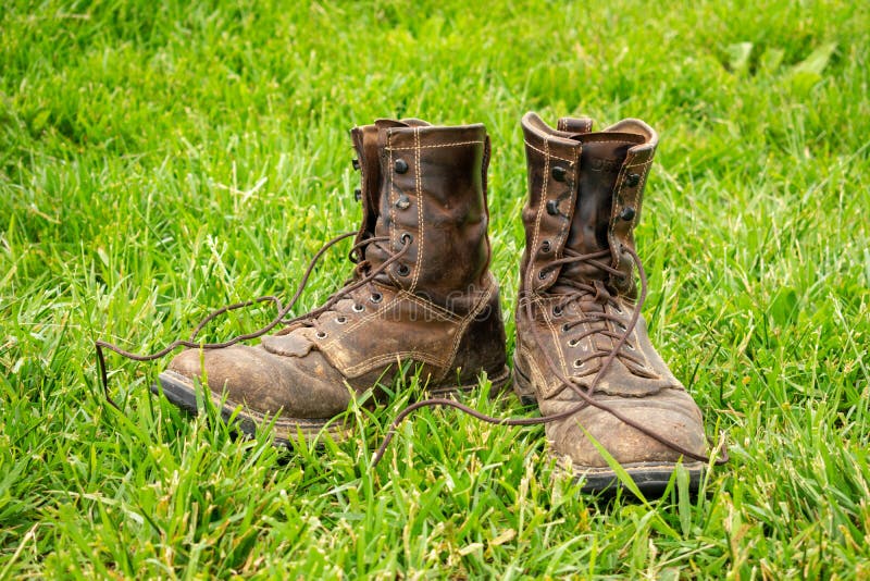A Pair of Work Boots in the Grass Stock Photo - Image of foot, winter ...