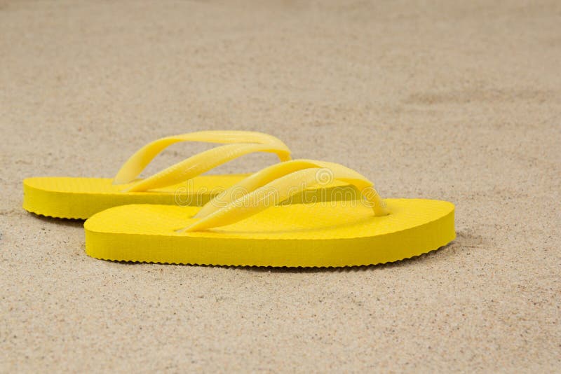 Yellow Beach Flip Flop Shoes Isolated on White Stock Photo - Image of ...