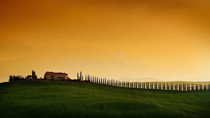 Paisaje de Toscana de la puesta del sol fotografía de archivo libre de regalías Paisaje de Toscana de la puesta del sol fotografía de archivo libre de regalías