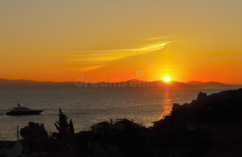 Magical sunset scenery. View from Paxos island. Magical sunset scenery. View from Paxos island.