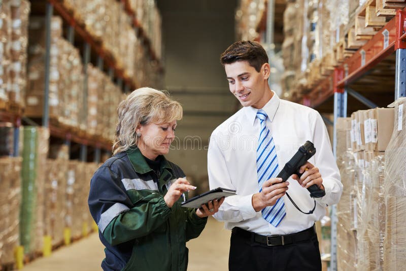 Pakhuisbemanning op het werk stock afbeelding Pakhuisbemanning op het werk stock afbeelding