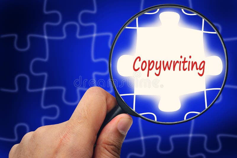 Palavra de Copywriting Lente de aumento e enigmas foto de stock