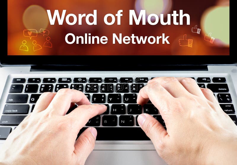 Word of mouth online network word on notebook screen with hand type on keyboard, Digital marketing concept. Word of mouth online network word on notebook screen with hand type on keyboard, Digital marketing concept.