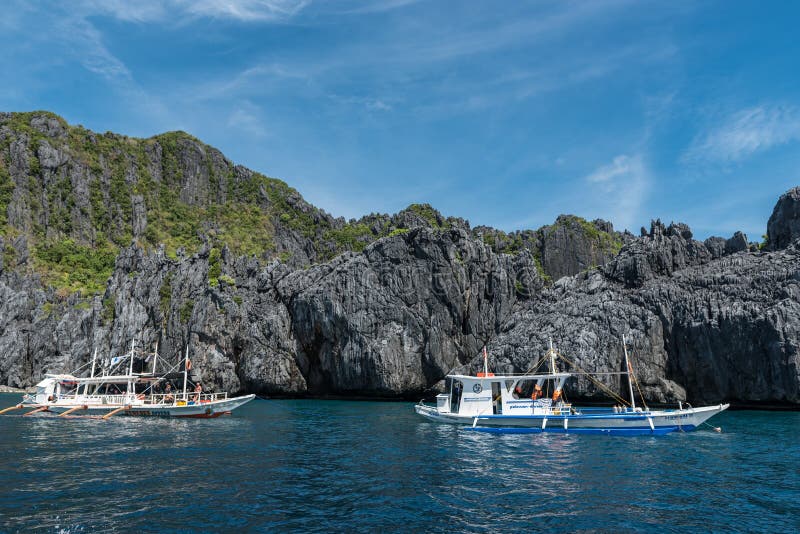 PALAWAN, PHILIPPINES - JANUARY 24, 2018: El Nido divers boat. People are taking private tours to dive into the sea.