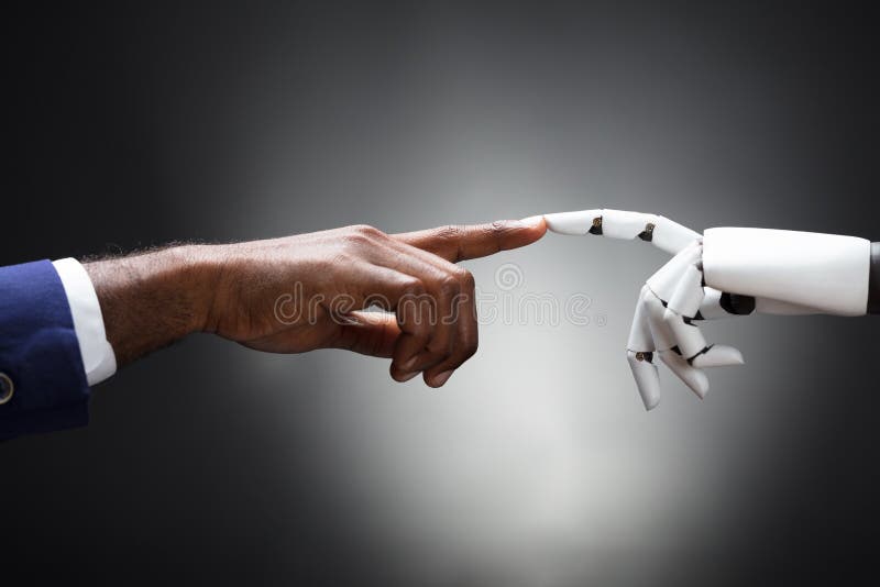 Palce robota I mężczyzna macanie fotografia stock Palce robota I mężczyzna macanie fotografia stock