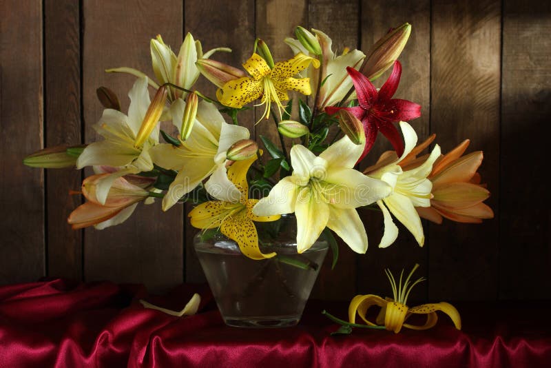 Pale lilies with water drops. still life with a bouquet