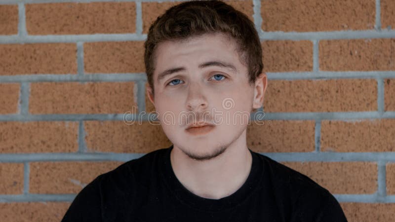 Premium Photo  A black man with blue eyes and a black background